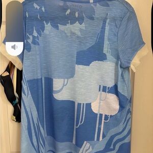 Disney Couture L Greetings from Sleeping Beauty’s castle v-neck with fringe hems